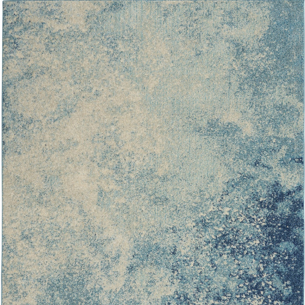 5' X 7' Blue And Ivory Abstract Area Rug