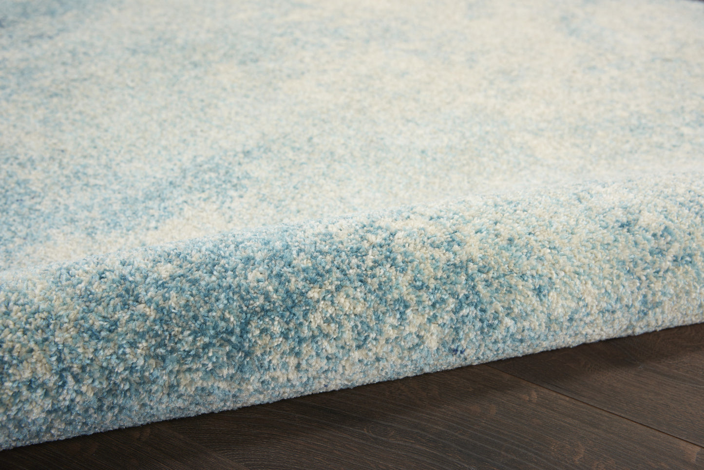 5' X 7' Blue And Ivory Abstract Area Rug