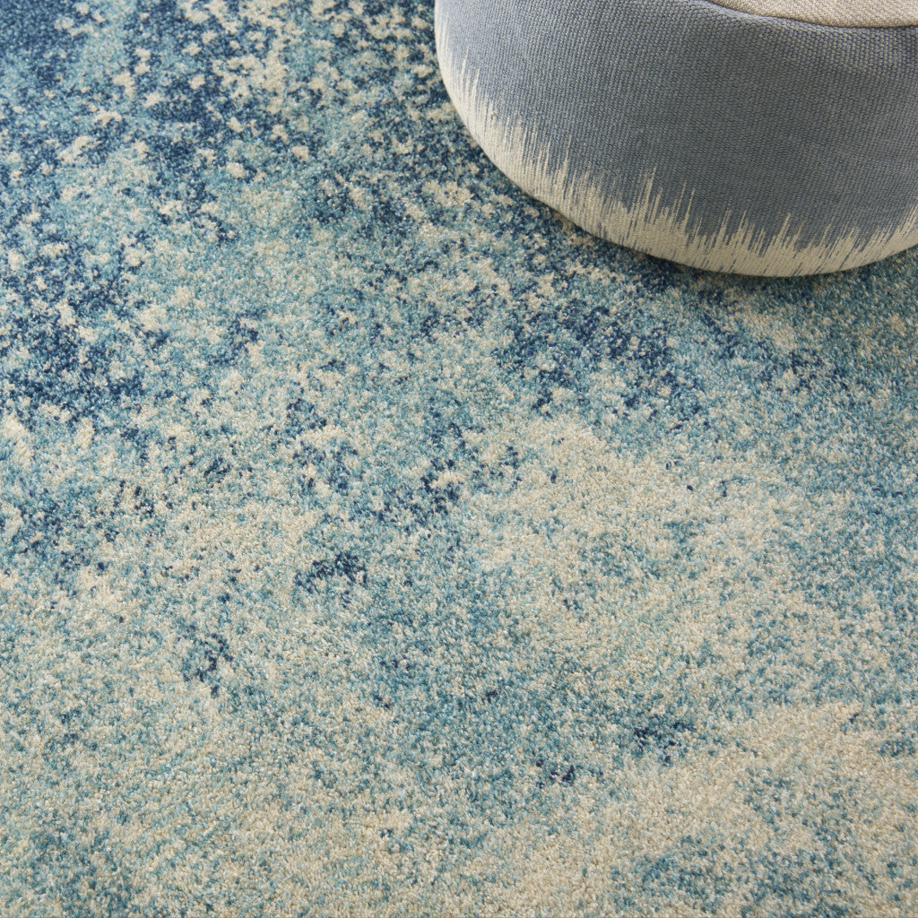 5' X 7' Blue And Ivory Abstract Area Rug