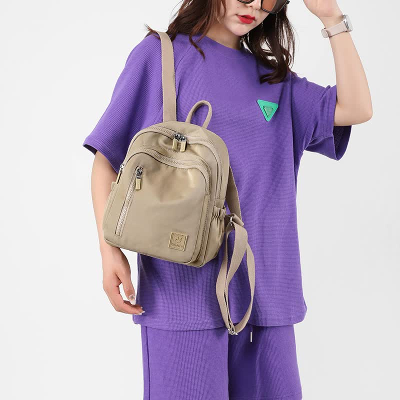 NNEDSZ Purple Mini Nylon Multi-Compartment Backpack - Lightweight and Stylish Everyday Bag